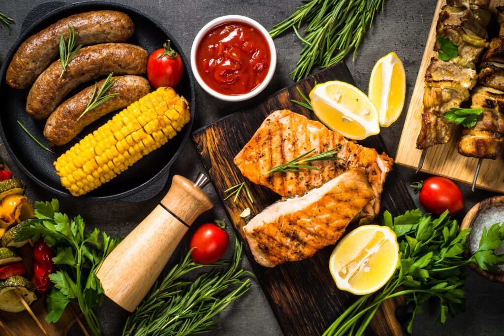Barbeque dish - Grilled meat, fish, sausages and vegetables